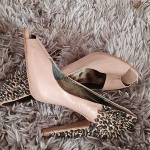 Peep toe spikes heels